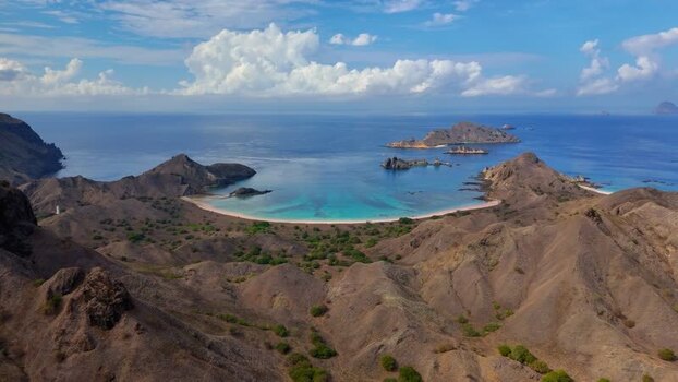 Aerial view of Komodo National Park with its iconic bay and hills Indonesia. Aerial view of Komodo National Park with its iconic bay and hills Indonesia.