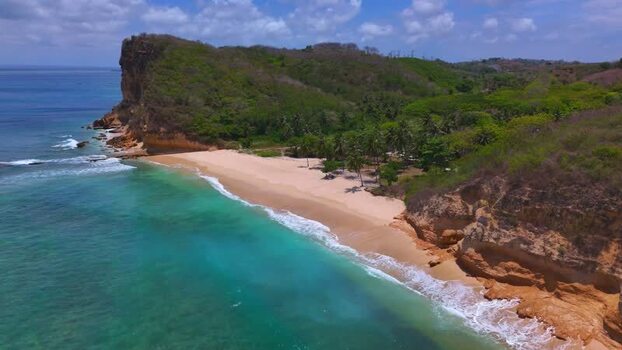 Aerial view of Pink Beach with turquoise water in Indonesia. Aerial view of Pink Beach with turquoise water in Indonesia.