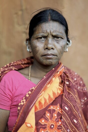 Odisha India 26 March 2026 View of a woman s face etched with tradition adorned in vibrant colors against a muted backdrop telling tales of heritage. Odisha India 26 March 2026 View of a woman s face etched with tradition adorned in vibrant colors against a muted backdrop telling tales of heritage.