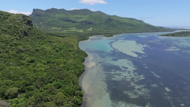 Aerial view of Le Morne Brabant mountain and lagoon Mauritius.