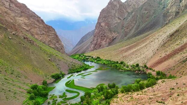 Aerial view of Qullai Vudor and the river valley Tajikistan. Aerial view of Qullai Vudor and the river valley Tajikistan.