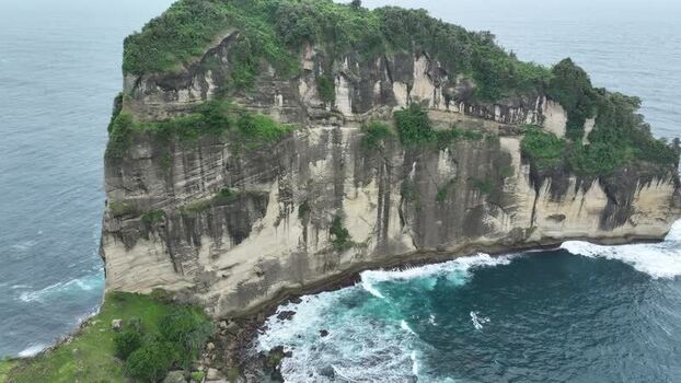 FPV aerial view of Pantai Pangasan Indonesia.