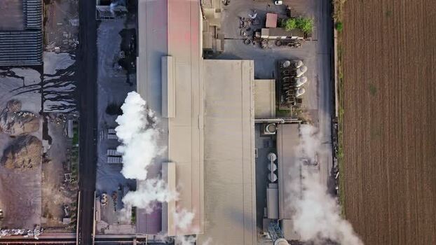 Aerial view of industrial buildings with smoke Serbia.