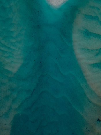 Aerial view of the turquoise waters and sandbars of Cudgen Creek in Tweed Shire Council New South Wales Australia.