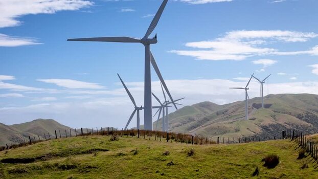 Aerial view of Makara Wind Farm turbines on hills New Zealand. Aerial view of Makara Wind Farm turbines on hills New Zealand.