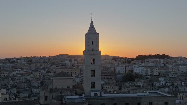 Aerial view of Matera Cathedral at sunset in Italy.