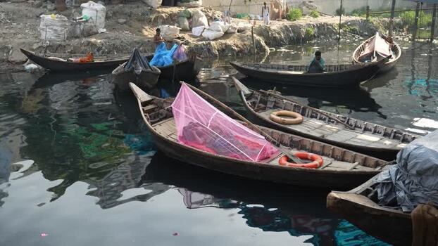 View of wooden boats at Sadarghat river port Bangladesh.