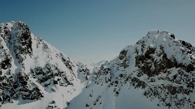 Aerial view of snowy peaks in Baqueira Spain.