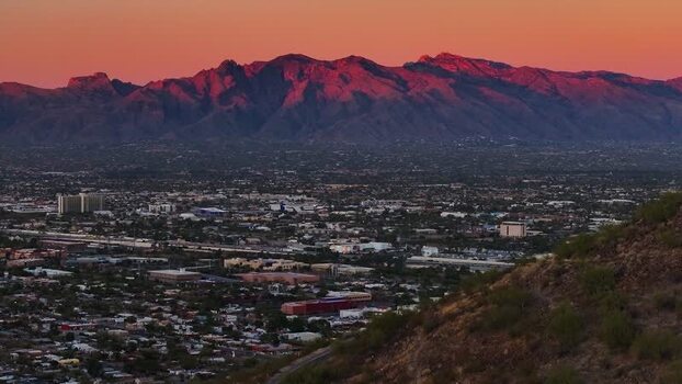 Aerial view of city and mountains United States. Aerial view of city and mountains United States.