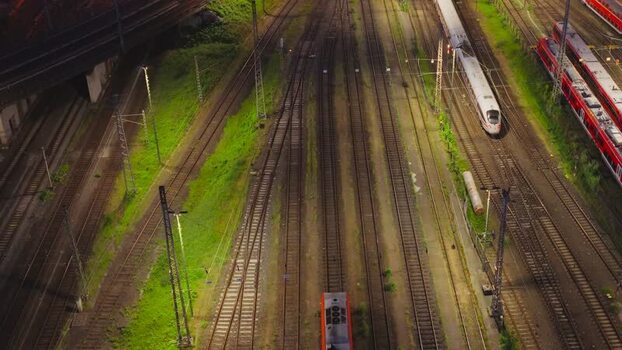 Aerial view of Hauptbahnhof railway tracks and trains Germany.