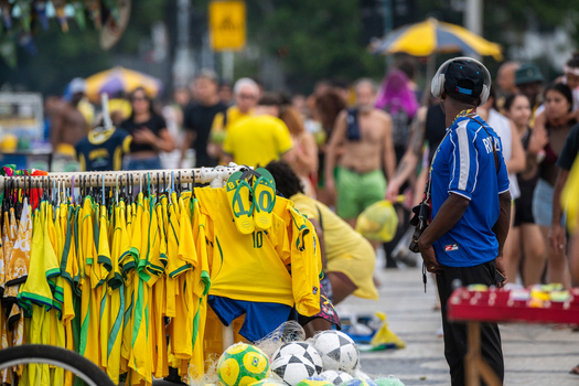 Rio de Janeiro Brazil 13 June 2026 View of a street vendor selling yellow and green Brazil national team jerseys and soccer balls to fans during the World Cup 2026.