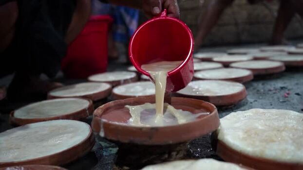 View of traditional yogurt preparation in Bogura Bangladesh. View of traditional yogurt preparation in Bogura Bangladesh.
