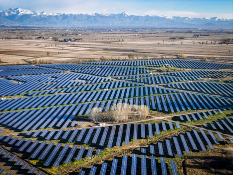 Trino Italy 30 March 2026 Aerial view of solar panels stretching across the landscape a symphony of blue against the backdrop of distant snow capped mountains. Trino Italy 30 March 2026 Aerial view of solar panels stretching across the landscape a symphony of blue against the backdrop of distant snow capped mountains.