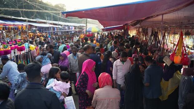 View of a crowded local market with people and stalls Bangladesh. View of a crowded local market with people and stalls Bangladesh.