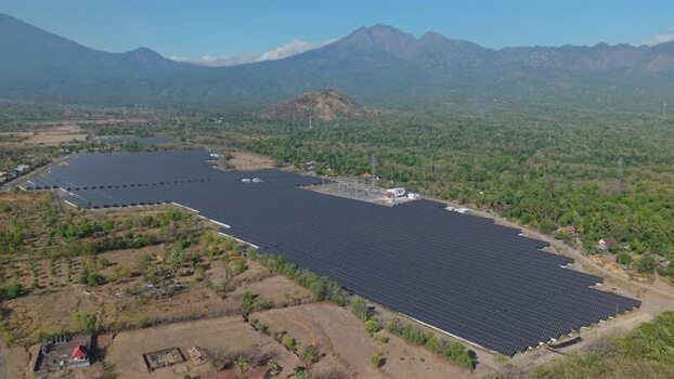 Aerial view of PLTS Bali Timur solar plant in Kubu Indonesia. Aerial view of PLTS Bali Timur solar plant in Kubu Indonesia.