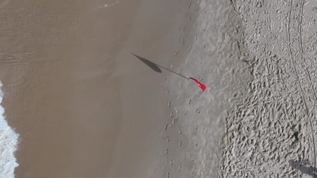 Aerial view of a red flag on Copacabana Beach Brazil.