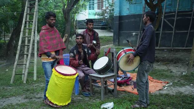 View of men playing traditional drums in Bogura Bangladesh. View of men playing traditional drums in Bogura Bangladesh.