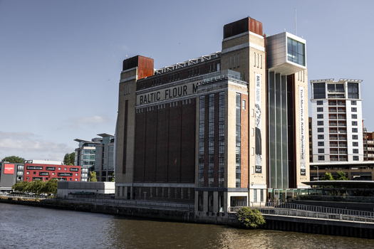 Newcastle upon Tyne United Kingdom 13 July 2026 View of the Baltic Centre for Contemporary Art a former flour mill with brick facade and glass extension along the River Tyne. Newcastle upon Tyne United Kingdom 13 July 2026 View of the Baltic Centre for Contemporary Art a former flour mill with brick facade and glass extension along the River Tyne.