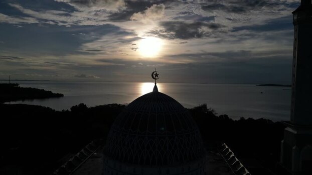 Aerial view of Masjid Raya Nur Ilahi at sunset Indonesia. Aerial view of Masjid Raya Nur Ilahi at sunset Indonesia.