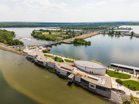 Aerial view of the Danubiana Meulensteen Art Museum on the Danube river with modern architecture and green parks in Bratislava Bratislavsky kraj Slovakia. Aerial view of the Danubiana Meulensteen Art Museum on the Danube river with modern architecture and green parks in Bratislava Bratislavsky kraj Slovakia.