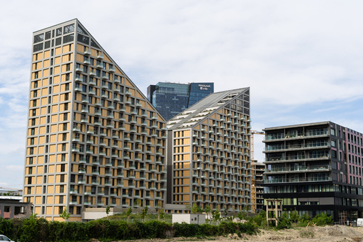 Bratislava Slovakia 09 May 2026 View of the modern Sky Park residential complex with its iconic sloping roofs and glass balconies under a cloudy sky.