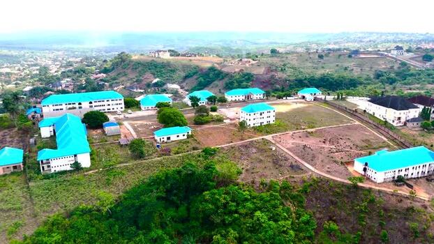 Aerial view of buildings with turquoise roofs Nigeria. Aerial view of buildings with turquoise roofs Nigeria.