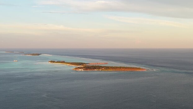 Aerial view of tropical islands and turquoise lagoons Maldives. Aerial view of tropical islands and turquoise lagoons Maldives.