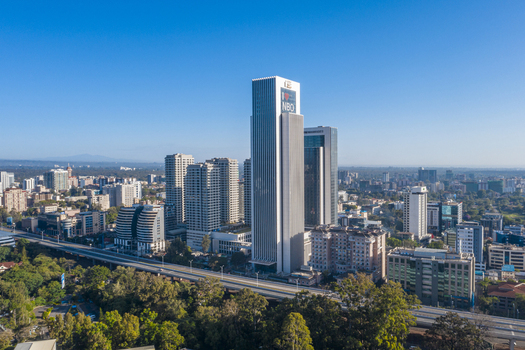 Aerial view of the Westlands district skyline featuring the GTC Tower modern skyscrapers and surrounding urban greenery in Nairobi Nairobi County Kenya. Aerial view of the Westlands district skyline featuring the GTC Tower modern skyscrapers and surrounding urban greenery in Nairobi Nairobi County Kenya.