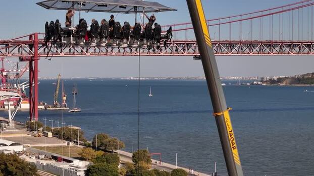 Aerial view of Dinner in the Sky suspended by crane Portugal. Aerial view of Dinner in the Sky suspended by crane Portugal.
