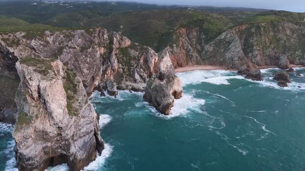 Aerial view of Ursa Beach and rugged cliffs Portugal.