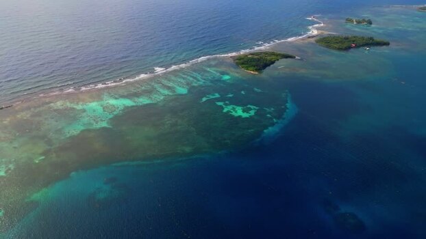 Aerial view of coral reefs and tropical cays in Guanaja Honduras. Aerial view of coral reefs and tropical cays in Guanaja Honduras.