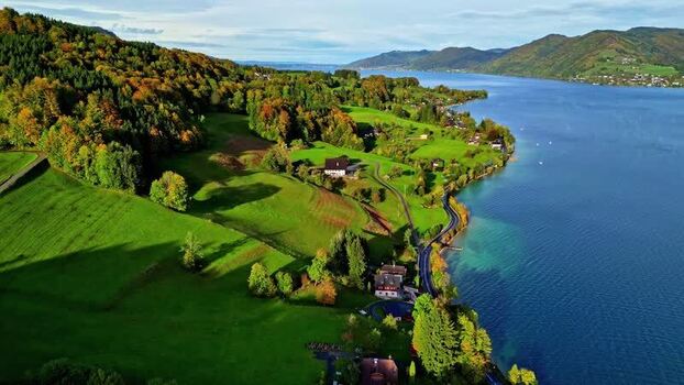 Aerial view of Attersee lake with autumn trees Austria.