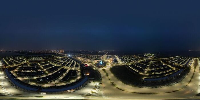 Aerial view of Golf Island in PIK at night featuring illuminated residential streets modern housing and coastal infrastructure in Kecamatan Penjaringan Daerah Khusus Ibukota Indonesia. Aerial view of Golf Island in PIK at night featuring illuminated residential streets modern housing and coastal infrastructure in Kecamatan Penjaringan Daerah Khusus Ibukota Indonesia.