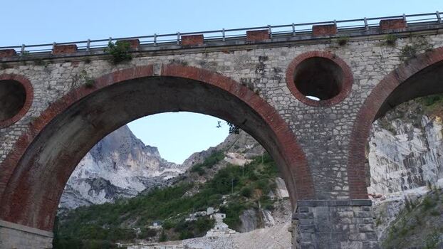 Aerial view of stone bridge in Carrara marble quarries Italy. Aerial view of stone bridge in Carrara marble quarries Italy.