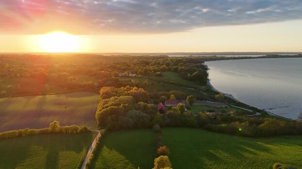 Aerial view of Bockholmwik coastline at sunset Germany.