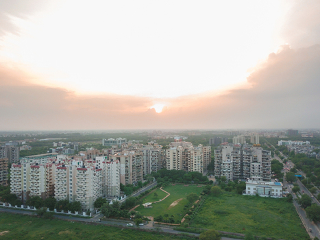 Aerial view of a residential block in dwarka sector 18A during sunset in Delhi India.