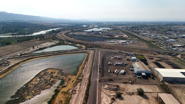 Grand Junction United States 03 July 2026 Aerial view of retention ponds surrounded by industrial facilities railway tracks and arid landscape in Colorado. Grand Junction United States 03 July 2026 Aerial view of retention ponds surrounded by industrial facilities railway tracks and arid landscape in Colorado.