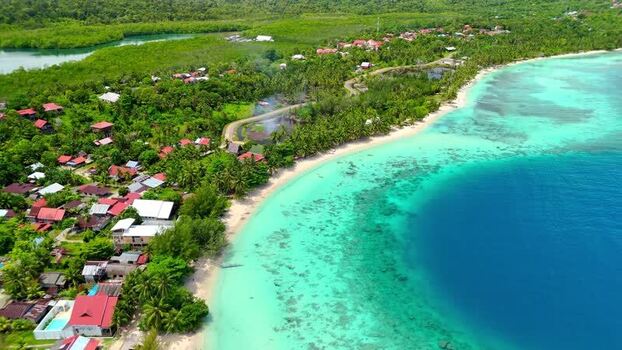 Aerial view of Sipura Island coastline and village Indonesia.