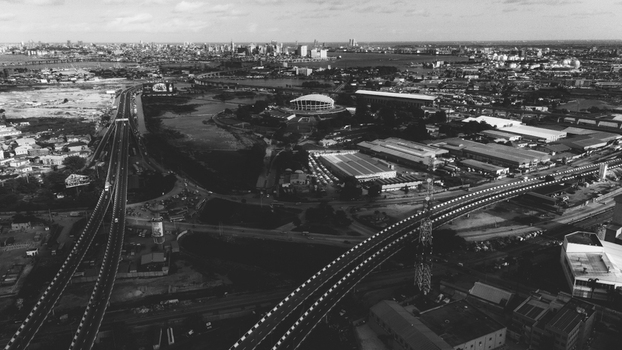 Aerial view of the Wole Soyinka Centre for Culture and Creative Arts National Theatre Nigeria and surrounding urban infrastructure with highways in Lagos Lagos Nigeria.