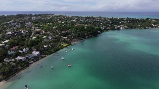 Aerial view of Grand Baie Public Beach and boats Mauritius.