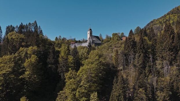 Aerial view of a historic church on a forested hill Italy. Aerial view of a historic church on a forested hill Italy.