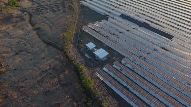 Aerial view of PLTS Bali Timur solar power plant in Indonesia. Aerial view of PLTS Bali Timur solar power plant in Indonesia.