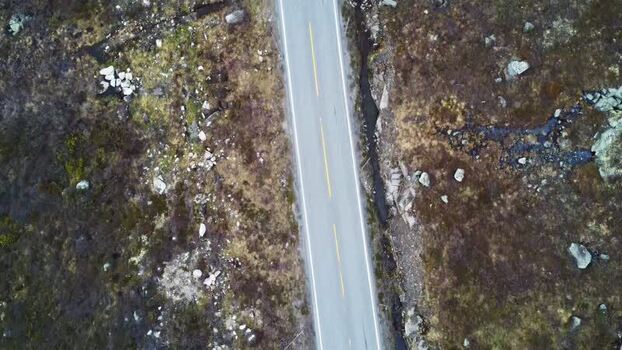 Aerial view of a road crossing the Hardangervidda plateau Norway. Aerial view of a road crossing the Hardangervidda plateau Norway.