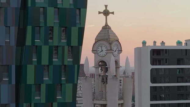 Aerial view of a church bell tower and modern buildings Albania.