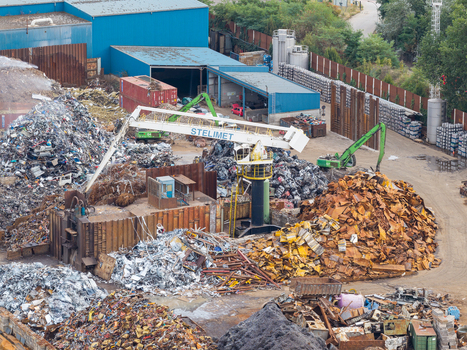 Genk Belgium 27 August 2026 Aerial view of the Haven Genk metal recycling facility featuring piles of scrap metal industrial machinery and processing equipment in an active yard. Genk Belgium 27 August 2026 Aerial view of the Haven Genk metal recycling facility featuring piles of scrap metal industrial machinery and processing equipment in an active yard.