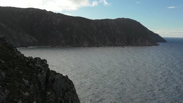 Aerial view of high cliffs and rocky coastline in Spain.