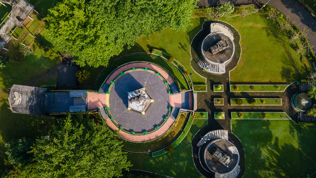 Purwokerto Indonesia 08 May 2026 Aerial view of National Monument of Jendral Soedirman featuring the circular plaza and central statue surrounded by lush green trees. Purwokerto Indonesia 08 May 2026 Aerial view of National Monument of Jendral Soedirman featuring the circular plaza and central statue surrounded by lush green trees.