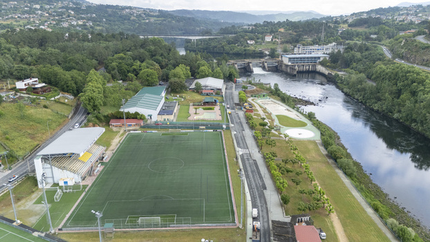 Ourense Spain 30 April 2026 Aerial view of Campo Municipal de Oira soccer field situated along the Minho River with a dam and lush green hills in the background. Ourense Spain 30 April 2026 Aerial view of Campo Municipal de Oira soccer field situated along the Minho River with a dam and lush green hills in the background.