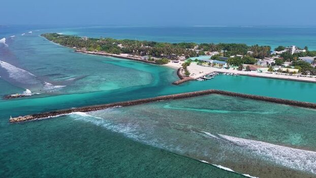 Aerial view of the tropical island of Vashafaru Maldives. Aerial view of the tropical island of Vashafaru Maldives.