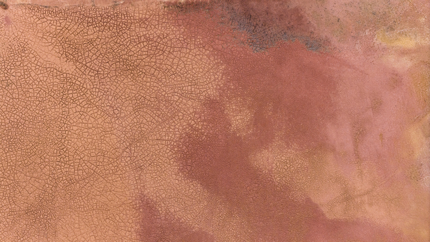 Aerial view of the salt lake patterns in Western Australia showing cracked earth textures in shades of pink brown and yellow after a storm Kalbarri Western Australia Australia. Aerial view of the salt lake patterns in Western Australia showing cracked earth textures in shades of pink brown and yellow after a storm Kalbarri Western Australia Australia.